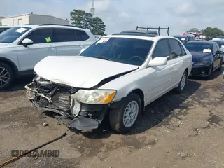 2001 Toyota Avalon XL z VIN 4T1BF28B71U166532, wystawiony jako IAAI lot #42149996 z przebiegiem 172 698 mil mil oraz . Historia ofert i sprzedaży dostępna na DreamBid. Obrazek 2.