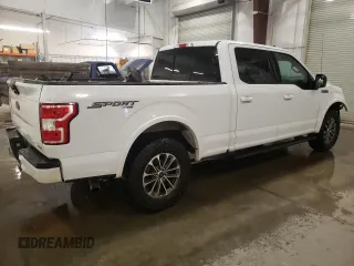 2020 Ford F-150 XL with VIN 1FTFW1E49LFC33659, listed as a Copart auction lot 52859575 with 104,623 mi miles and Salvage Title. Bid and sale history available at carsss.com. Image 3.