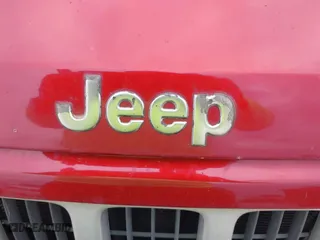 2004 Jeep Grand Cherokee Laredo with VIN 1J4GX48S14C259215, listed as a IAAI auction lot 41906121 with 142,668 mi miles. Bid and sale history available at carsss.com. Image 6.