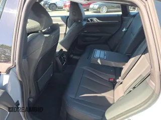 2024 BMW i4 M50 z VIN WBY33AW00RFT04066, wystawiony jako Copart lot #57458105 z przebiegiem 4754 mil mil oraz Szkody całkowita. Historia ofert i sprzedaży dostępna na DreamBid. Obrazek 11.