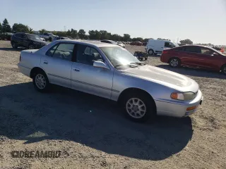 1995 Toyota Camry LE z VIN JT2SK12E1S0317363, wystawiony jako Copart lot #58652095 z przebiegiem 317 577 mil mil oraz Czysty tytuł • Clean title. Historia ofert i sprzedaży dostępna na DreamBid. Obrazek 4.