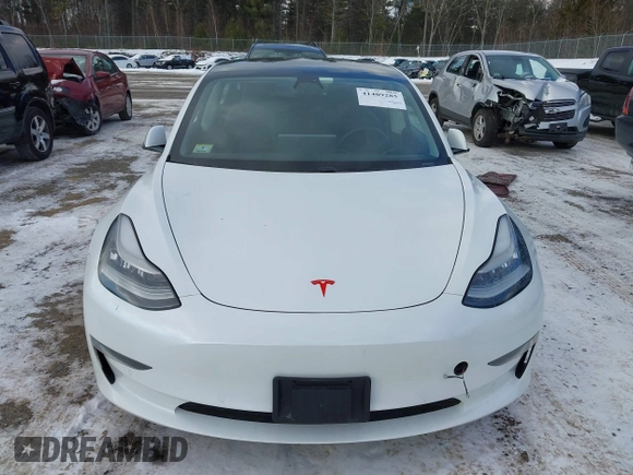 2020 Tesla Model 3 Standard Range Plus with VIN 5YJ3E1EA7LF742973, listed as a IAAI auction lot 41409285 with 48,993 mi miles and . Bid and sale history available at DreamBid. Image 12.