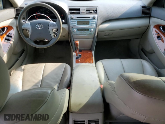 2009 Toyota Camry LE z VIN 4T1BK46K99U587464, wystawiony jako Copart lot #59171995 z przebiegiem 200 152 mil mil oraz Szkoda całkowita • Salvage title. Historia ofert i sprzedaży dostępna na DreamBid. Obrazek 8.