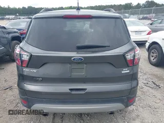 2017 Ford Escape SE z VIN 1FMCU0GD8HUE00754, wystawiony jako IAAI lot #42127911 z przebiegiem 169 487 mil mil oraz . Historia ofert i sprzedaży dostępna na DreamBid. Obrazek 16.