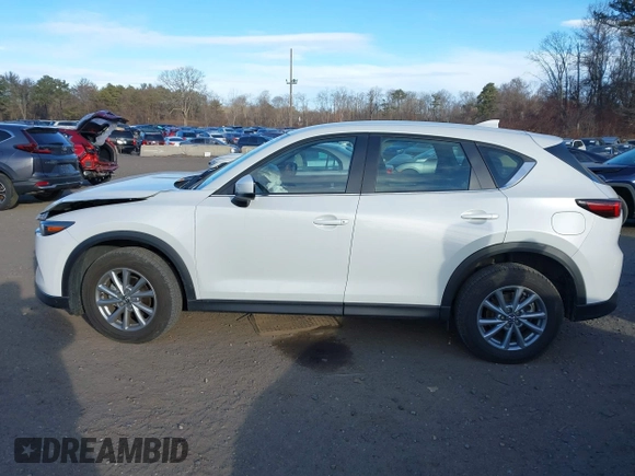 2023 Mazda CX-5 2.5 S with VIN JM3KFBAM0P0230661, listed as a IAAI auction lot 41287609 with 12,264 mi miles. Bid and sale history available at carsss.com. Image 14.