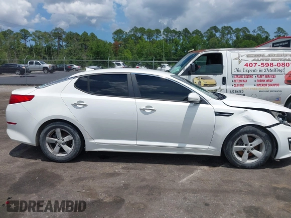 2015 Kia Optima LX with VIN KNAGM4A76F5639319, listed as a IAAI auction lot 42552130 with 207,006 mi miles and . Bid and sale history available at DreamBid. Image 13.
