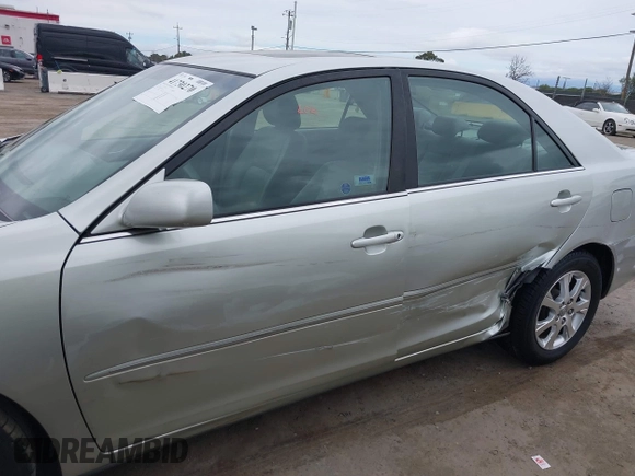 2005 Toyota Camry LE with VIN JTDBF30K650163057, listed as a IAAI auction lot 41730270 with 98,300 mi miles and . Bid and sale history available at DreamBid. Image 14.