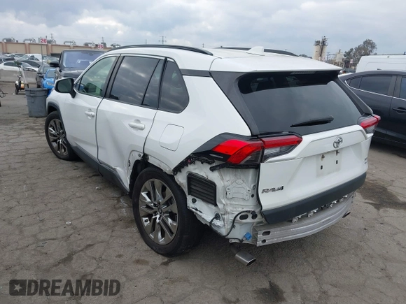 2019 Toyota RAV4 XLE Premium with VIN JTMA1RFV9KD513395, listed as a IAAI auction lot 41469143 with 28,406 mi miles. Bid and sale history available at carsss.com. Image 3.