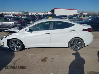 2015 Hyundai Elantra SE z VIN 5NPDH4AE9FH615055, wystawiony jako IAAI lot #41764627 z przebiegiem 143 708 mil mil oraz . Historia ofert i sprzedaży dostępna na DreamBid. Obrazek 14.