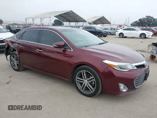 2013 Toyota Avalon XLE with VIN 4T1BK1EB1DU001297, listed as a IAAI auction lot 42041699 with 217,190 mi miles and . Bid and sale history available at DreamBid. Image 1.