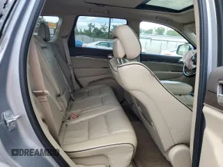 2015 Jeep Grand Cherokee Overland with VIN 1C4RJFCG3FC880084, listed as a Copart auction lot 57291165 with 112,442 mi miles and Salvage title. Bid and sale history available at DreamBid. Image 11.