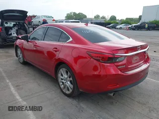 2016 Mazda 6 i Grand Touring with VIN JM1GJ1W57G1460281, listed as a IAAI auction lot 42016051 with 89,784 mi miles. Bid and sale history available at carsss.com. Image 3.
