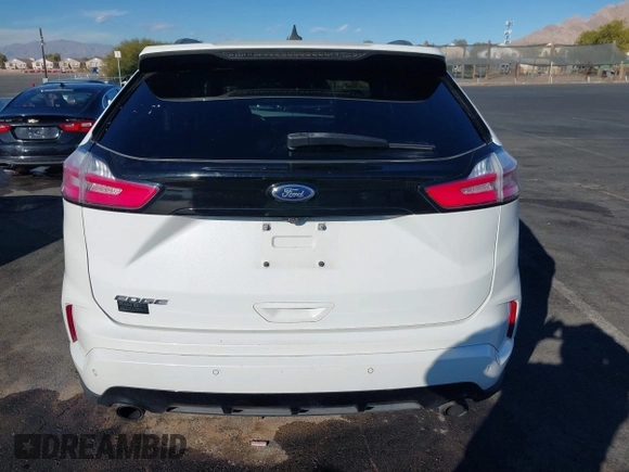 2020 Ford Edge SEL z VIN 2FMPK3J92LBB53467, wystawiony jako IAAI lot #41241115 z przebiegiem 58 183 mil mil oraz . Historia ofert i sprzedaży dostępna na DreamBid. Obrazek 16.
