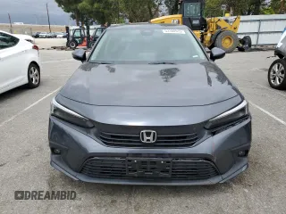 2022 Honda Civic Touring z VIN 2HGFE1F93NH314236, wystawiony jako Copart lot #53380915 z przebiegiem 25 302 mil mil oraz Szkoda całkowita • Salvage title. Historia ofert i sprzedaży dostępna na DreamBid. Obrazek 5.