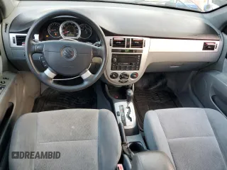 2004 Suzuki Forenza S z VIN KL5JD52Z94K061669, wystawiony jako Copart lot #81585854 z przebiegiem 80 186 mil mil oraz Szkody całkowita. Historia ofert i sprzedaży dostępna na DreamBid. Obrazek 8.