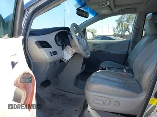 2013 Toyota Sienna XLE AAS with VIN 5TDYK3DC8DS318180, listed as a IAAI auction lot 42374479 with 189,977 mi miles and . Bid and sale history available at DreamBid. Image 5.