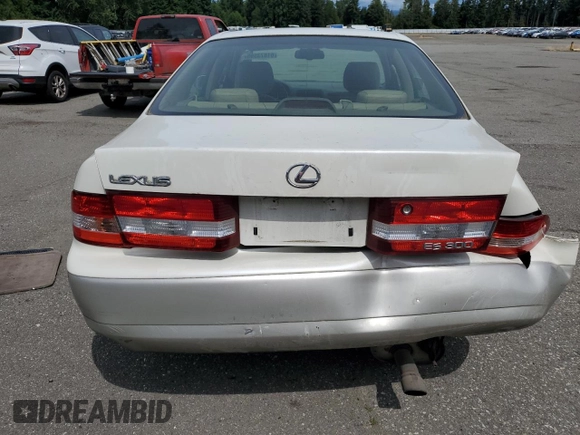 2000 Lexus ES 300 with VIN JT8BF28G6Y5099537, listed as a Copart auction lot 61873595 with 167,090 mi miles and Salvage title. Bid and sale history available at DreamBid. Image 6.
