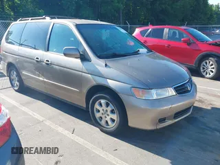2004 Honda Odyssey EX-L with VIN 5FNRL18044B072819, listed as a IAAI auction lot 42441279 with 264,950 mi miles and . Bid and sale history available at DreamBid. Image 1.