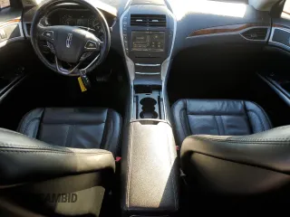 2016 Lincoln MKZ with VIN 3LN6L2JK8GR616239, listed as a Copart auction lot 87861415 with 99,199 mi miles and Salvage title. Bid and sale history available at DreamBid. Image 8.