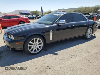 2009 Jaguar XJ 8 with VIN SAJWA71B79SH30431, listed as a Copart auction lot 52403185 with 67,143 mi miles and Salvage Title. Bid and sale history available at DreamBid. Image 1.