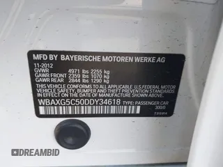 2013 BMW 5 Series 528i with VIN WBAXG5C50DDY34618, listed as a IAAI auction lot 41665956 with 85,088 mi miles and . Bid and sale history available at carsss.com. Image 9.