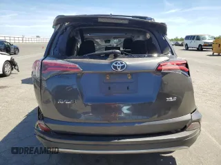 2018 Toyota RAV4 XLE with VIN JTMWFREV6JJ172451, listed as a Copart auction lot 58095775 with Not provided miles and Salvage title. Bid and sale history available at DreamBid. Image 6.