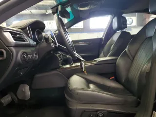 2015 Maserati Ghibli S Q4 with VIN ZAM57RTA3F1150242, listed as a Copart auction lot 61202585 with 21,271 mi miles and Salvage title. Bid and sale history available at DreamBid. Image 7.