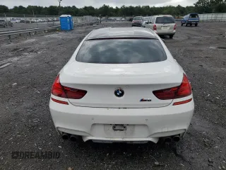 2015 BMW M6 z VIN WBS6C9C56FD467625, wystawiony jako Copart lot #64269363 z przebiegiem 92 698 mil mil oraz Nie do naprawy. Historia ofert i sprzedaży dostępna na DreamBid. Obrazek 6.