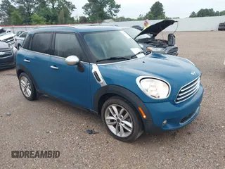 2012 MINI Countryman with VIN WMWZB3C56CWM06101, listed as a IAAI auction lot 42223616 with 149,680 mi miles and . Bid and sale history available at DreamBid. Image 1.