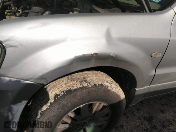 2007 Mercury Mariner Premier с VIN 4M2CU97107KJ08843, выставлен на аукционе IAAI как лот 41748968 с пробегом 194 183 миль миль и . История ставок и продаж доступна на DreamBid. Изображение 6.