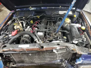 1997 Jeep Cherokee Country with VIN 1J4FJ78S0VL592781, listed as a Copart auction lot 83209464 with 287,206 mi miles and Salvage Title. Bid and sale history available at carsss.com. Image 11.