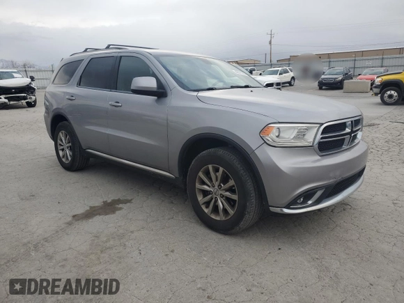 2017 Dodge Durango SXT with VIN 1C4RDJAG4HC871572, listed as a Copart auction lot 49011225 with 137,326 mi miles and Salvage title. Bid and sale history available at DreamBid. Image 4.