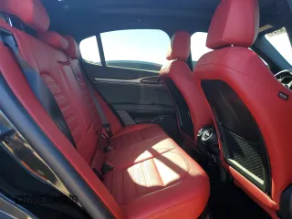 2024 Alfa Romeo Stelvio Ti z VIN ZASPAKBNXR7D70884, wystawiony jako Copart lot #87212794 z przebiegiem 15 162 mil mil oraz Szkoda całkowita • Salvage title. Historia ofert i sprzedaży dostępna na DreamBid. Obrazek 11.