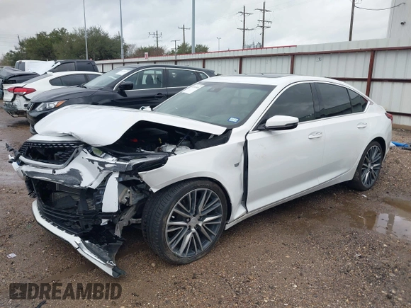 2023 Cadillac CT5 Premium Luxury z VIN 1G6DN5RKXP0123435, wystawiony jako IAAI lot #41565443 z przebiegiem 31 263 mil mil oraz . Historia ofert i sprzedaży dostępna na DreamBid. Obrazek 2.
