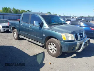 2004 Nissan Titan LE with VIN 1N6AA07B74N547779, listed as a IAAI auction lot 41977881 with 157,348 mi miles and . Bid and sale history available at carsss.com. Image 1.