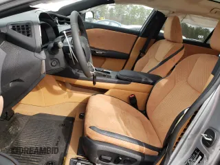 2023 Lexus RZ 450e Premium z VIN JTJAAAAB7PA005835, wystawiony jako Copart lot #42201414 z przebiegiem 2144 mil mil oraz . Historia ofert i sprzedaży dostępna na DreamBid. Obrazek 7.