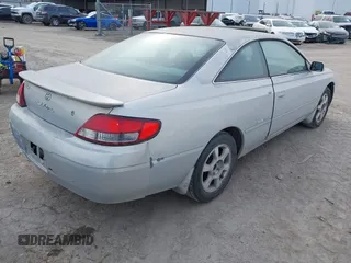 1999 Toyota Solara SE with VIN 2T1CF22P7XC106169, listed as a IAAI auction lot 41291391 with 297,339 mi miles. Bid and sale history available at carsss.com. Image 4.