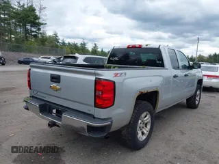 2014 Chevrolet Silverado 1500 LT with VIN 1GCVKREC8EZ151534, listed as a IAAI auction lot 42221023 with 216,835 mi miles and . Bid and sale history available at DreamBid. Image 4.