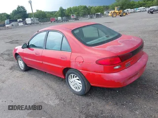 1997 Ford Escort LX with VIN 1FALP13P1VW418844, listed as a IAAI auction lot 42583584 with 145,463 mi miles and . Bid and sale history available at DreamBid. Image 3.
