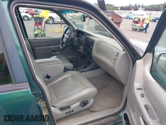 1999 Ford Explorer XLT with VIN 1FMZU34E1XZB72588, listed as a IAAI auction lot 42598441 with 233,717 mi miles and . Bid and sale history available at DreamBid. Image 5.