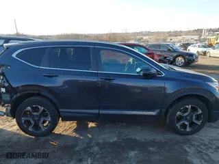 2017 Honda CR-V Touring with VIN 2HKRW2H90HH647274, listed as a IAAI auction lot 41572666 with 95,264 mi miles. Bid and sale history available at carsss.com. Image 14.