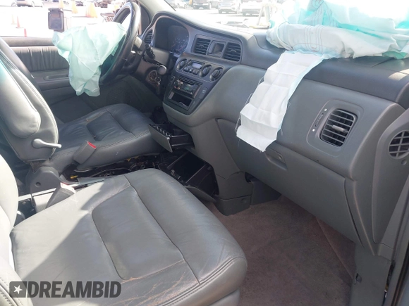 2003 Honda Odyssey EX-L with VIN 5FNRL18923B071598, listed as a IAAI auction lot 41947046 with 224,394 mi miles and . Bid and sale history available at DreamBid. Image 5.