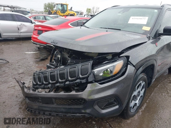 2022 Jeep Compass Trailhawk with VIN 3C4NJDDBXNT206118, listed as a IAAI auction lot 41945077 with 7,785 mi miles and . Bid and sale history available at DreamBid. Image 6.