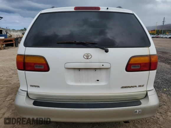 1999 Toyota Sienna LE with VIN 4T3ZF13C4XU134680, listed as a Copart auction lot 74044544 with 127,954 mi miles and Clean Title. Bid and sale history available at carsss.com. Image 6.