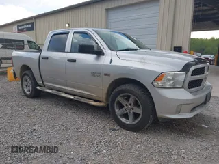 2014 Ram 1500 Express z VIN 1C6RR7KT9ES152522, wystawiony jako IAAI lot #42019411 z przebiegiem 264 390 mil mil oraz . Historia ofert i sprzedaży dostępna na DreamBid. Obrazek 1.