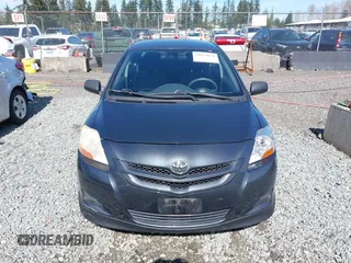 2007 Toyota Yaris with VIN JTDBT923371009887, listed as a IAAI auction lot 41852074 with 147,039 mi miles. Bid and sale history available at carsss.com. Image 12.