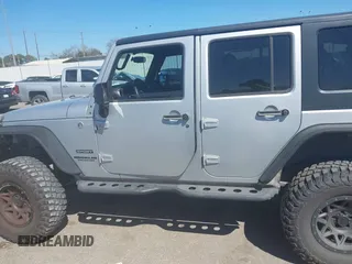 2012 Jeep Wrangler Unlimited Sport with VIN 1C4BJWDG8CL270788, listed as a IAAI auction lot 41758929 with 138,935 mi miles. Bid and sale history available at carsss.com. Image 14.