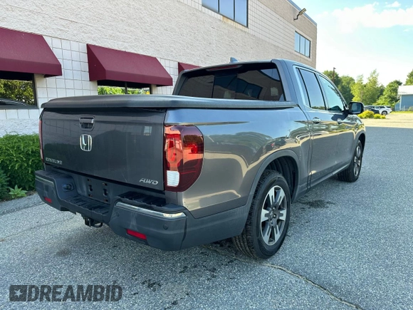 2019 Honda Ridgeline RTL-E with VIN 5FPYK3F71KB009532, listed as a Copart auction lot 65827935 with 217,177 mi miles and Clean title. Bid and sale history available at DreamBid. Image 4.