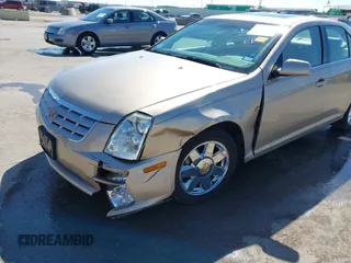 2005 Cadillac STS z VIN 1G6DC67A950171835, wystawiony jako IAAI lot #41599105 z przebiegiem 74 235 mil mil oraz . Historia ofert i sprzedaży dostępna na DreamBid. Obrazek 6.