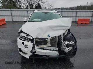 2014 BMW X5 xDrive35i with VIN 5UXKR0C50E0K42458, listed as a Copart auction lot 52069455 with 146,602 mi miles and Salvage Title. Bid and sale history available at carsss.com. Image 5.